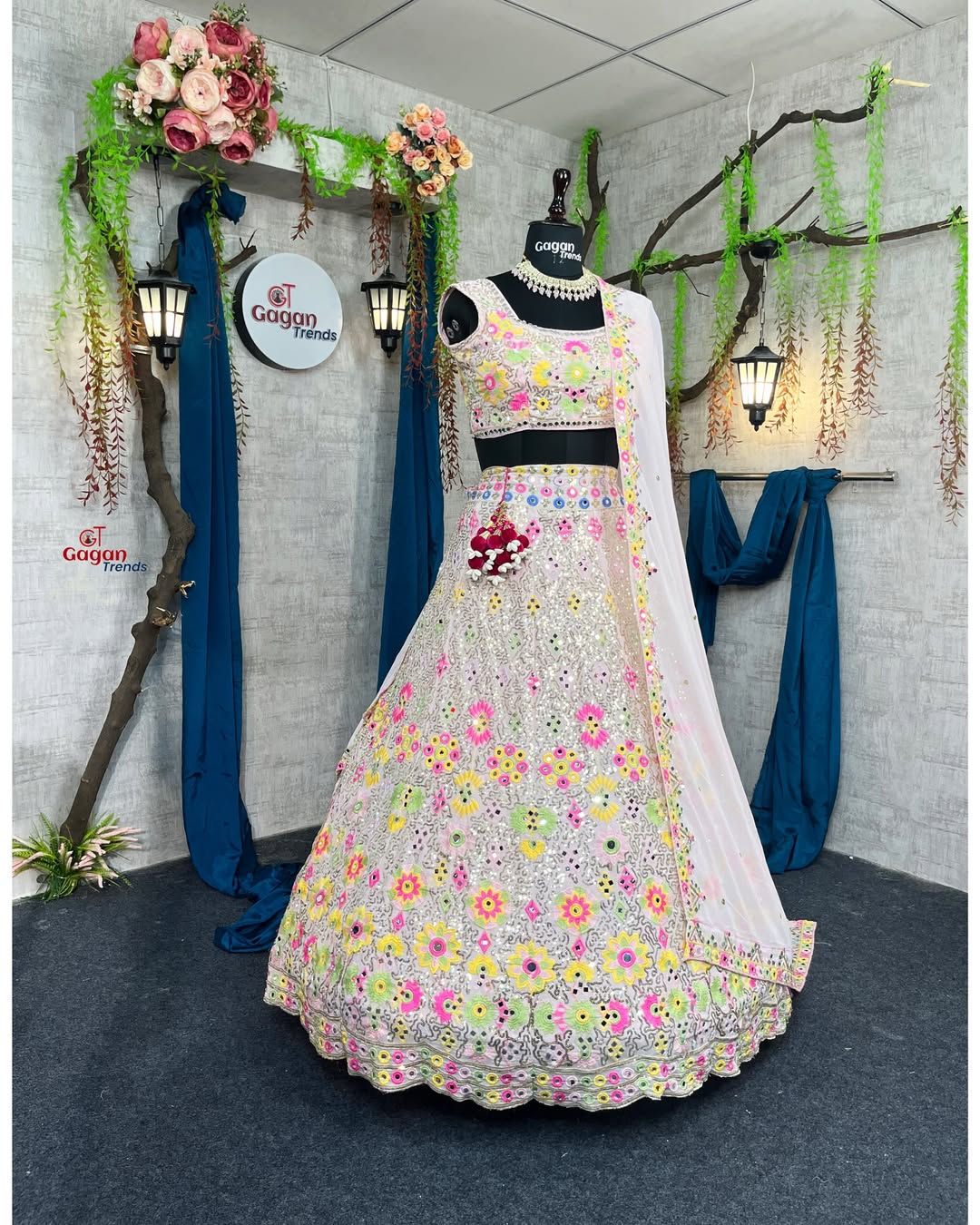Multi colour Luxurious Faux Georgette lehenga with Mirror and  designer blouse