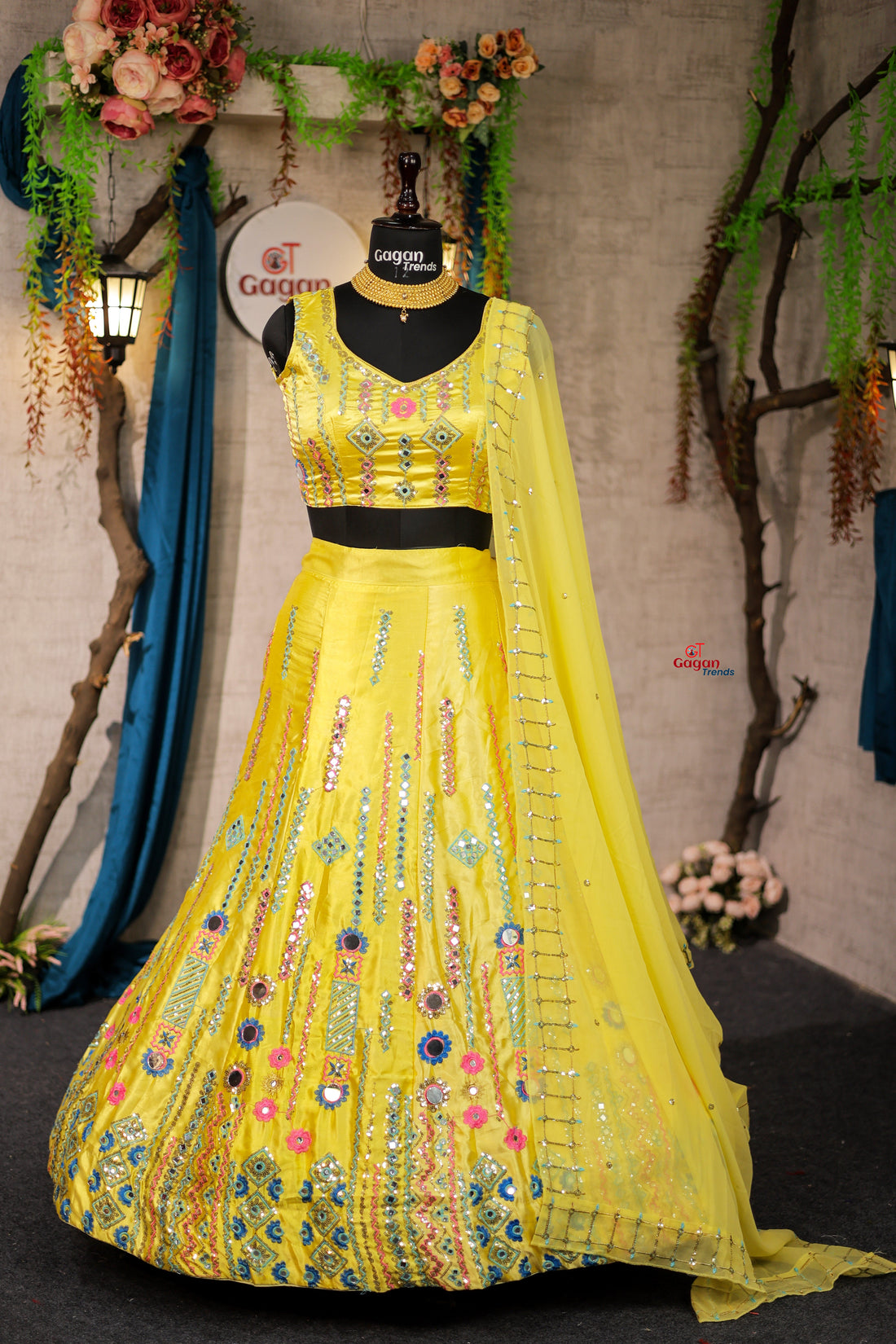 Yellow Japan Satin Silk lehenga with delicate mirror work and designer blouse perfect match for you