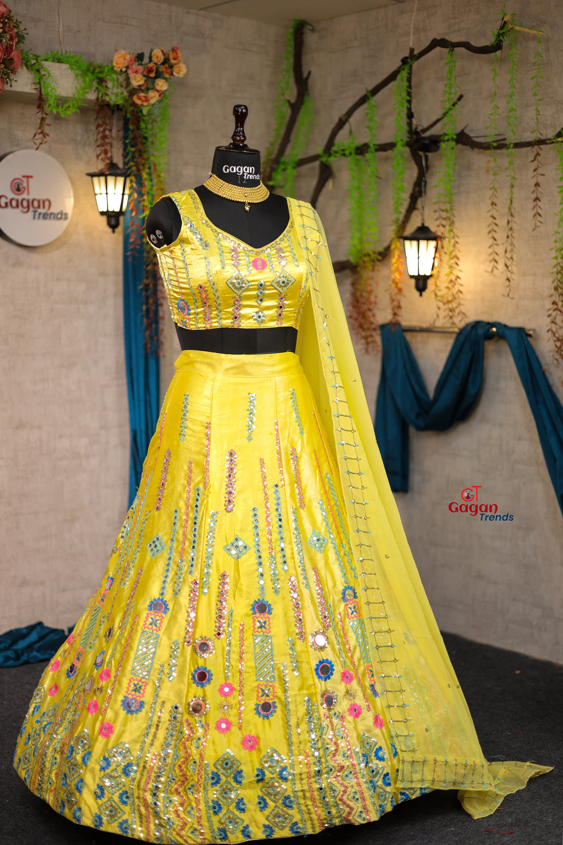 Yellow Japan Satin Silk lehenga with delicate mirror work and designer blouse perfect match for you