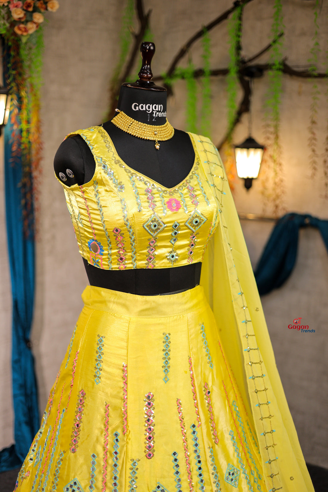 Yellow Japan Satin Silk lehenga with delicate mirror work and designer blouse perfect match for you