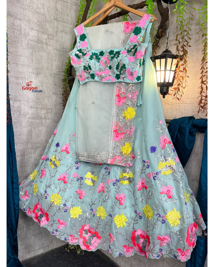 Elegant Faux Georgette Lehenga with Heavy Sequins Embroidery & Net Dupatta – Perfect for Weddings & Parties
