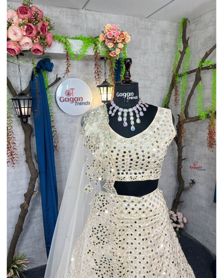 White colour lehenga with mirror work and attarctive lahenga with blouse
