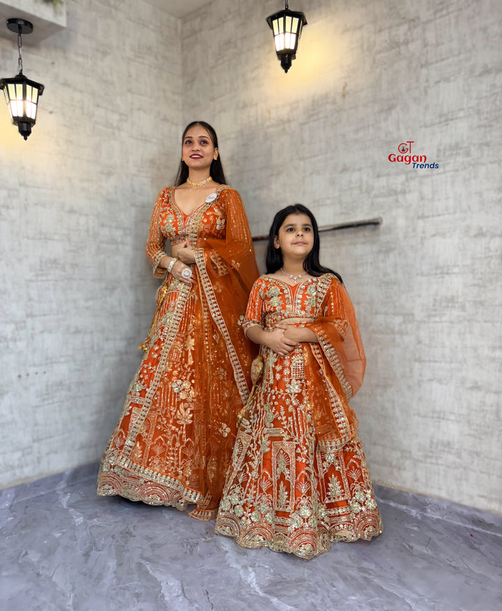 orange colour Mom-Daughter Soft Net Lehenga Choli Set with Coding Sequins & Dupatta – Matching Ethnic Outfit