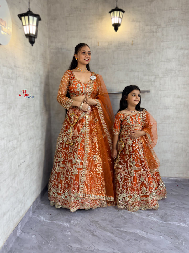 orange colour Mom-Daughter Soft Net Lehenga Choli Set with Coding Sequins & Dupatta – Matching Ethnic Outfit